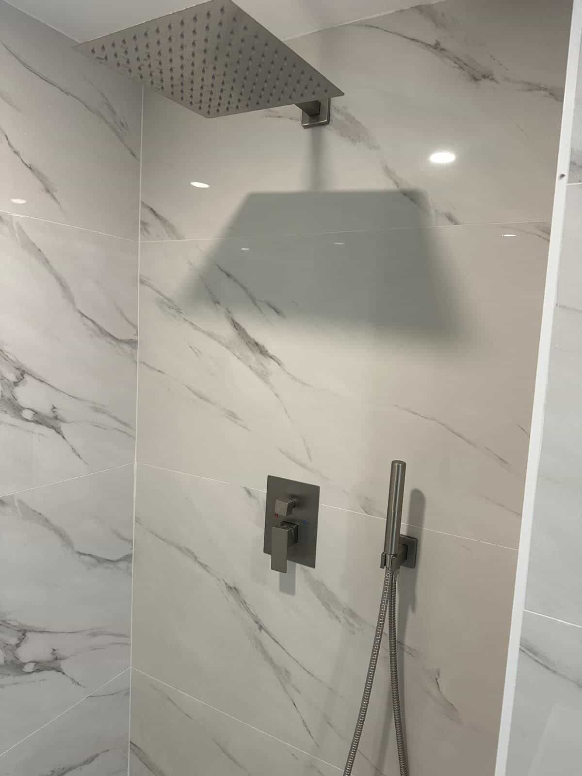 Before and after of a Bathroom remodeling by a plumber in Palmetto Bay
