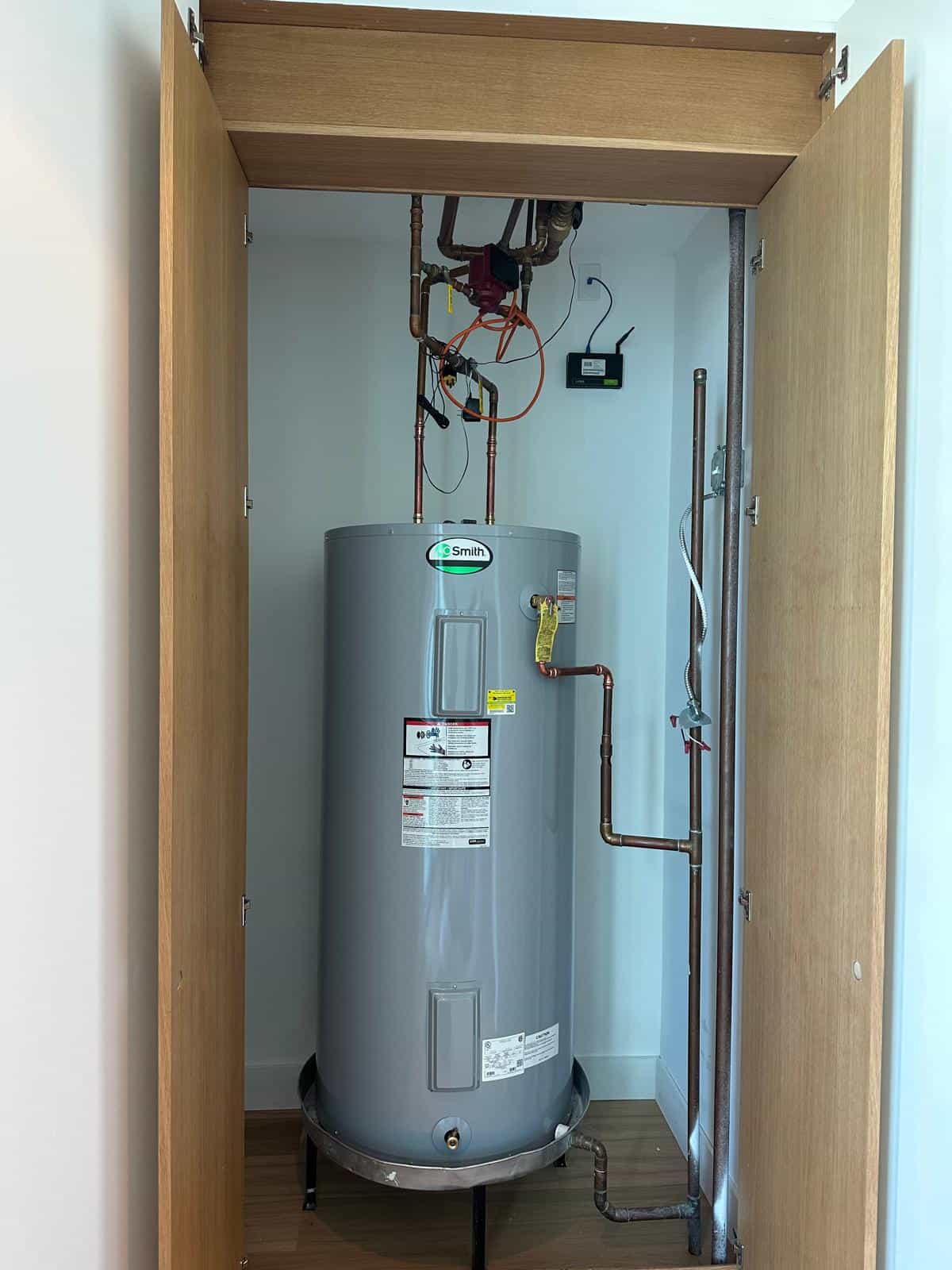Before and after of a Water Heater by a plumber in Palmetto Bay