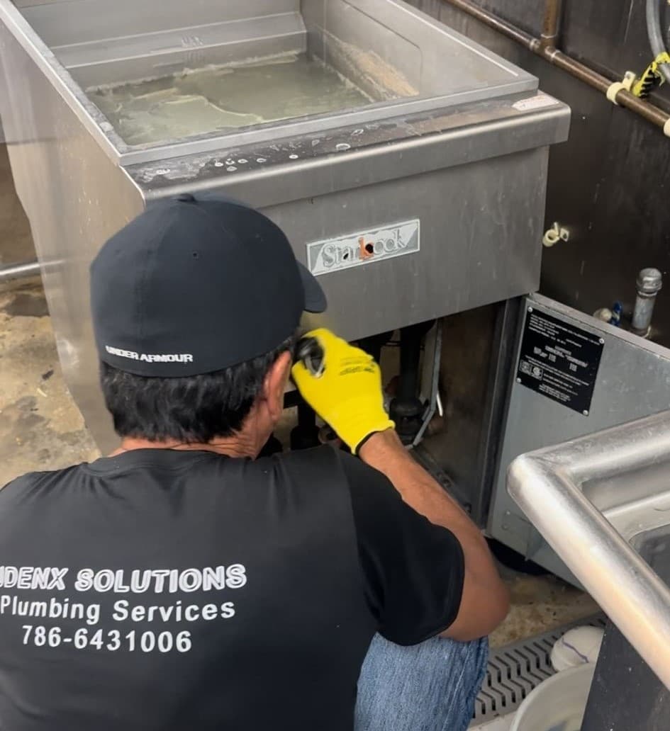 Plumber in Palmetto Bay working on a project